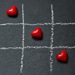 Hearts on a noughts and crosses grid