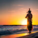 A Kahuna on a Beach at Sunset