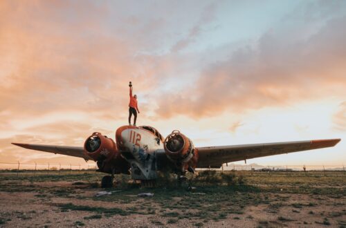 Someone celebrating a prize after finding an aircraft.