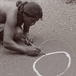 A member of the Australian First Nation transcribing a circle
