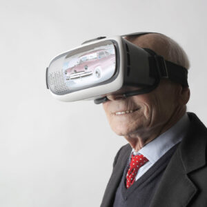 A man wearing a simulated reality headset.